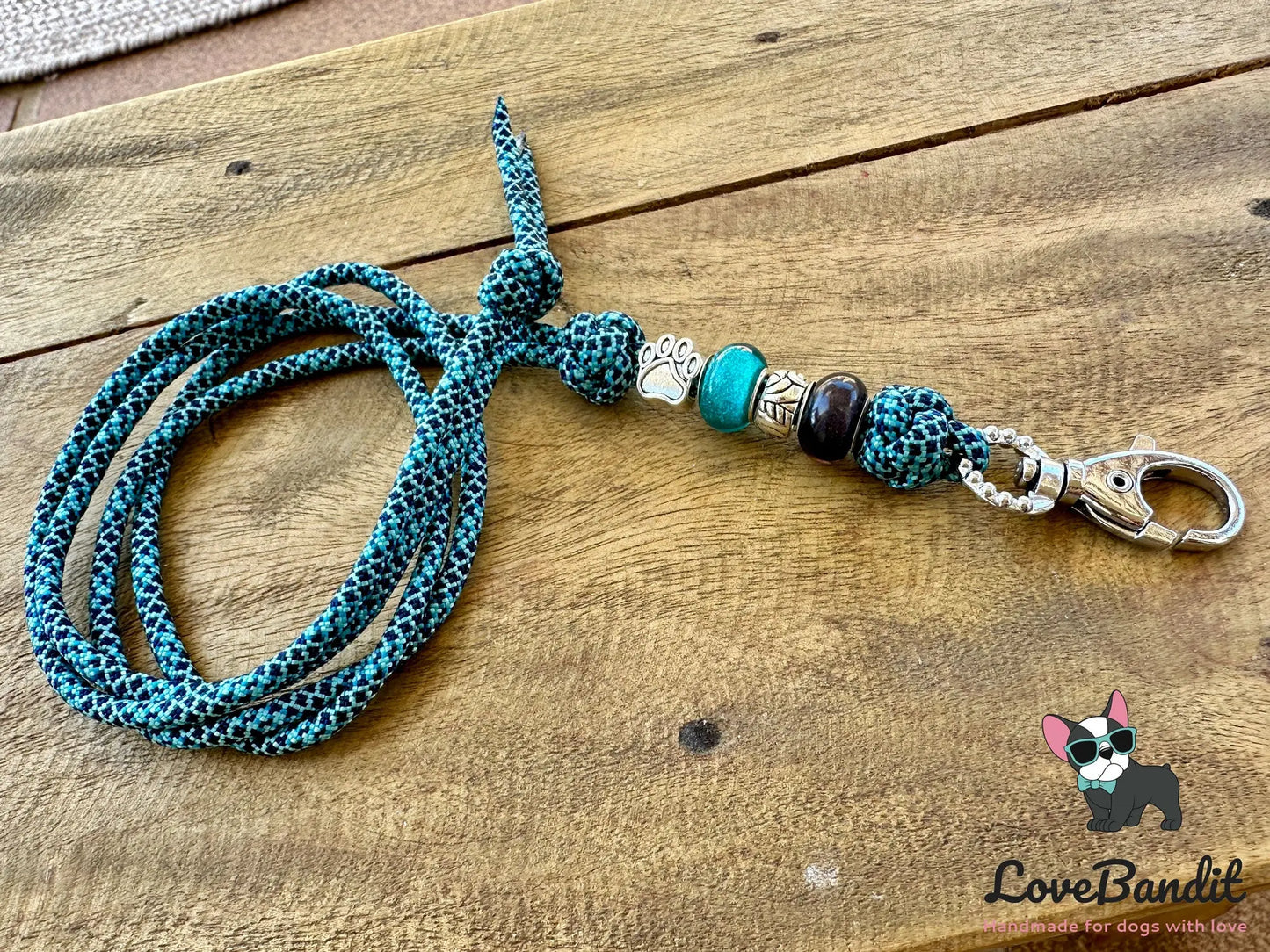Hundepfeifenband Pfote türkis aus Paracord - LoveBandit